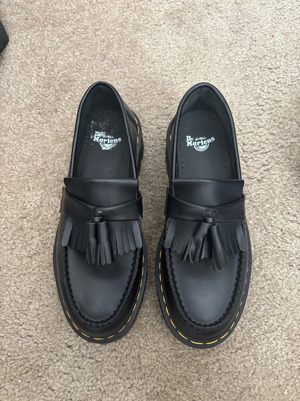 Dr. Martens Black Tassel Kiltie Loafers with Yellow Stitching